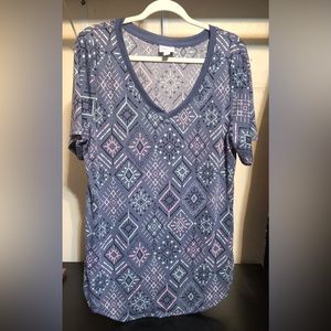 Lularoe Christy T. Light blue and pink shirt. New Size large.